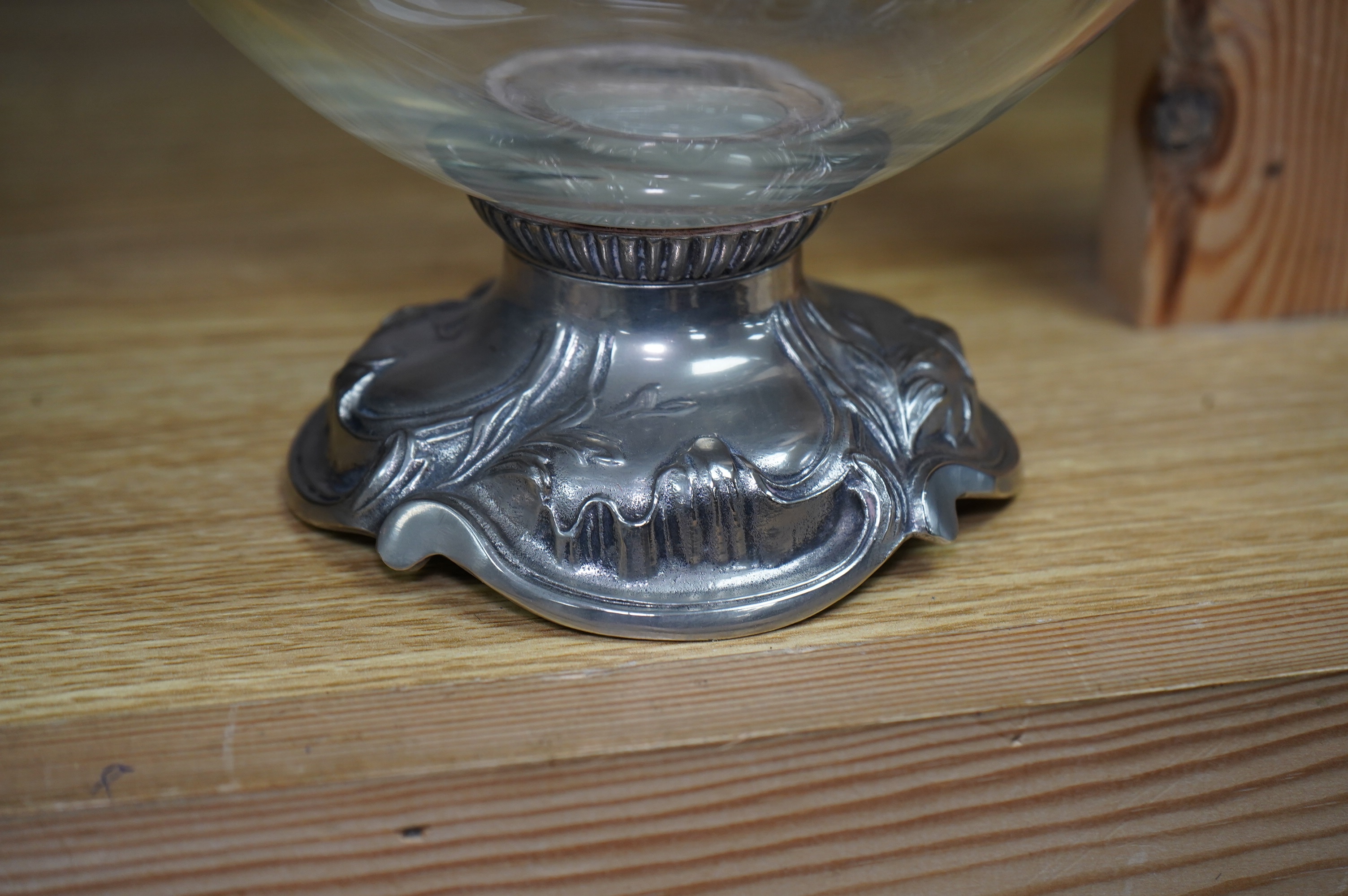 A pair of Art Nouveau silver plate mounted claret jugs with labels, 32cm. Condition - fair to good